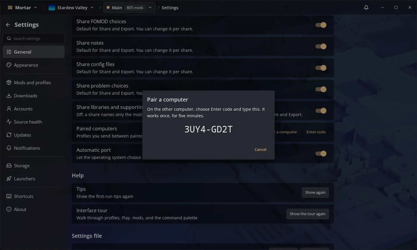 The Pair a computer dialog showing a one-time pairing code